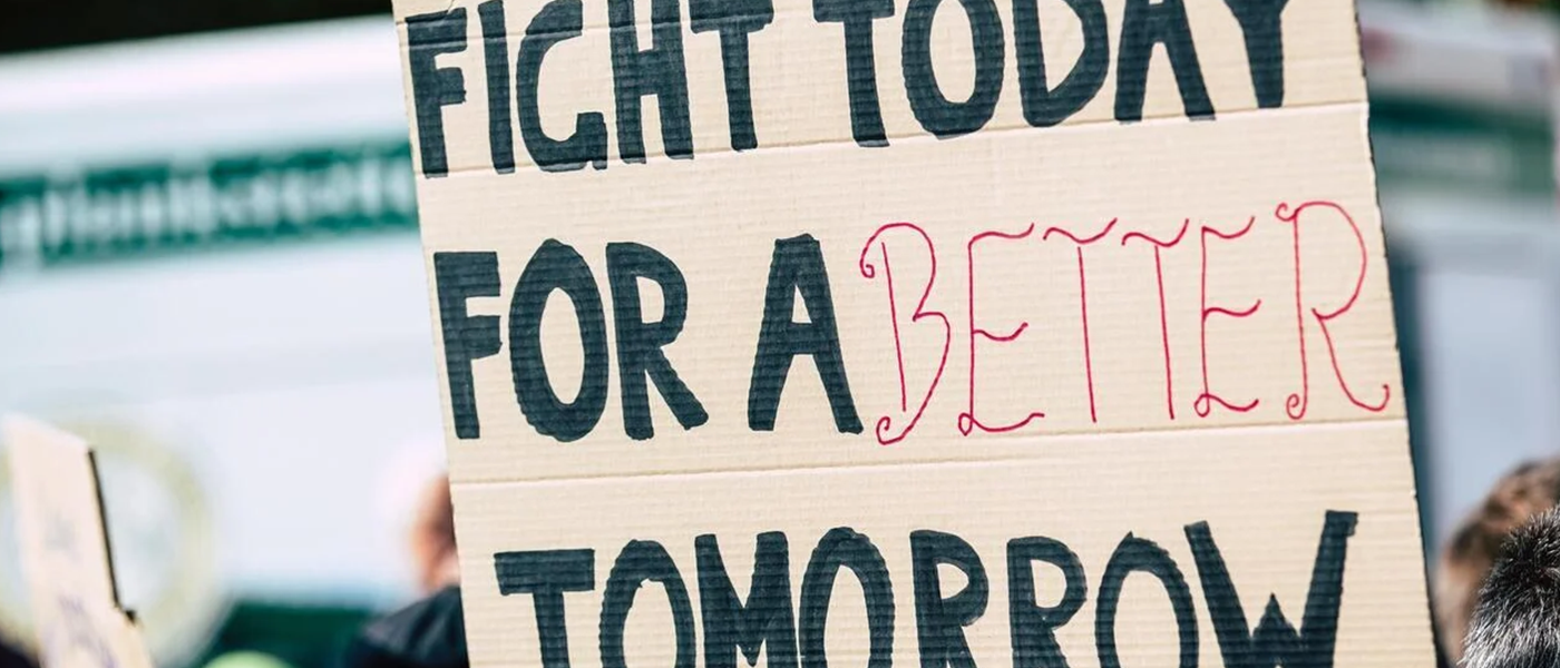 A placard reading 